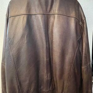 Vintage leather bomber jacket with removable lining flag and airplane graphic